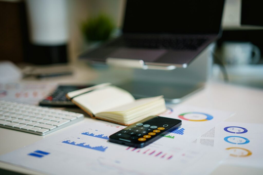 Financial report with calculations on an accountant's desk