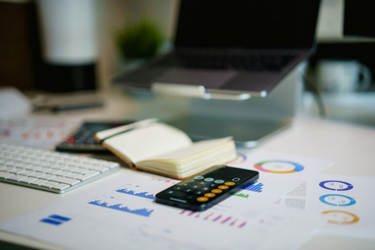 Financial report with calculations on an accountant's desk