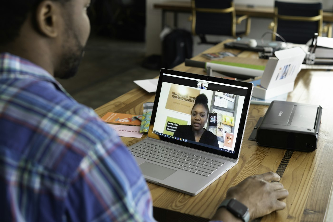 Staff member working on a virtual desktop during a video call