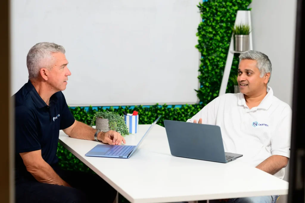 Jim Thomas from Digitek IT in a meeting with a small business owner