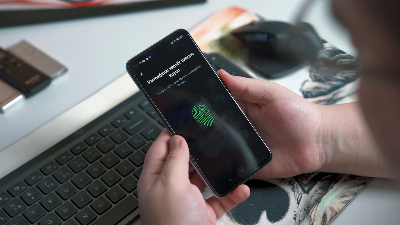 Using a fingerprint sensor on a phone to sign in