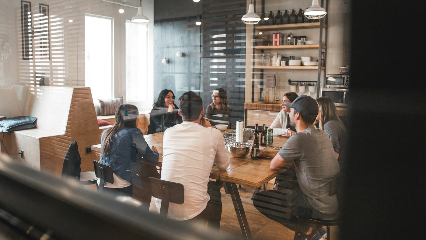 Team meeting around a table in an office